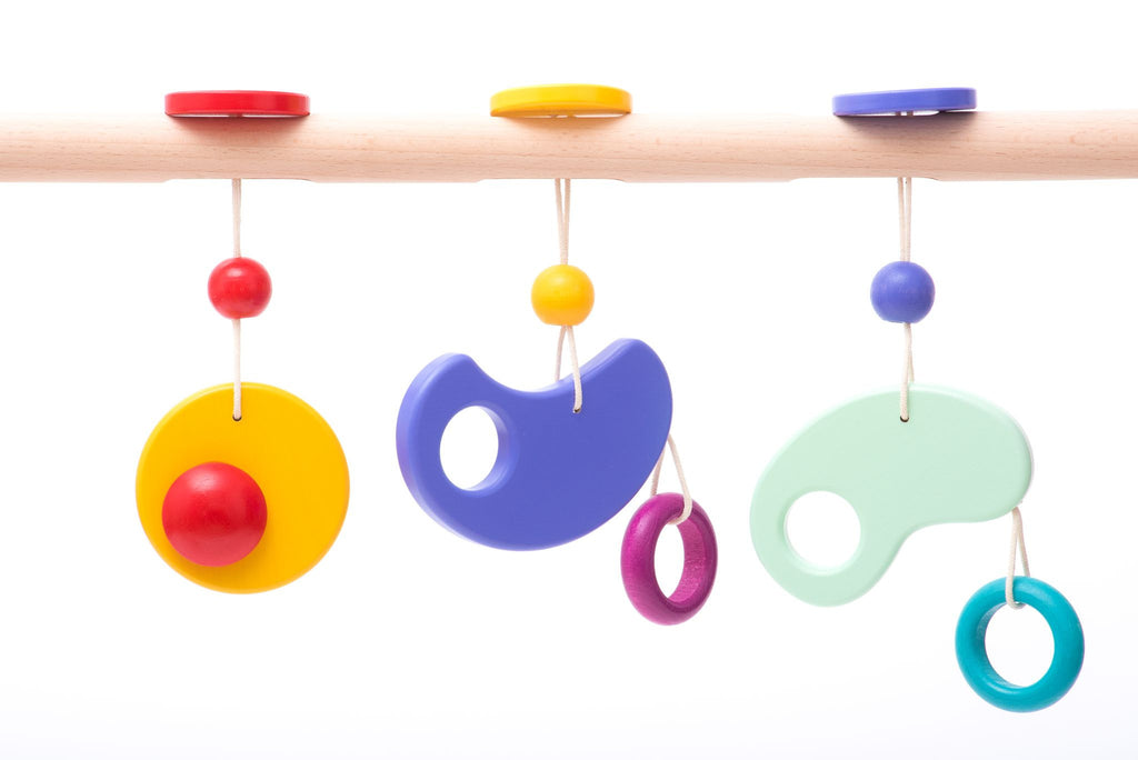 Wooden arch with toys - children's gym