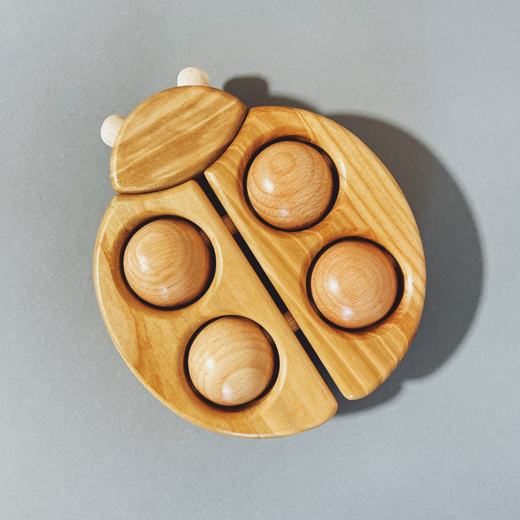 Holz Marienkäfer mit Rädern