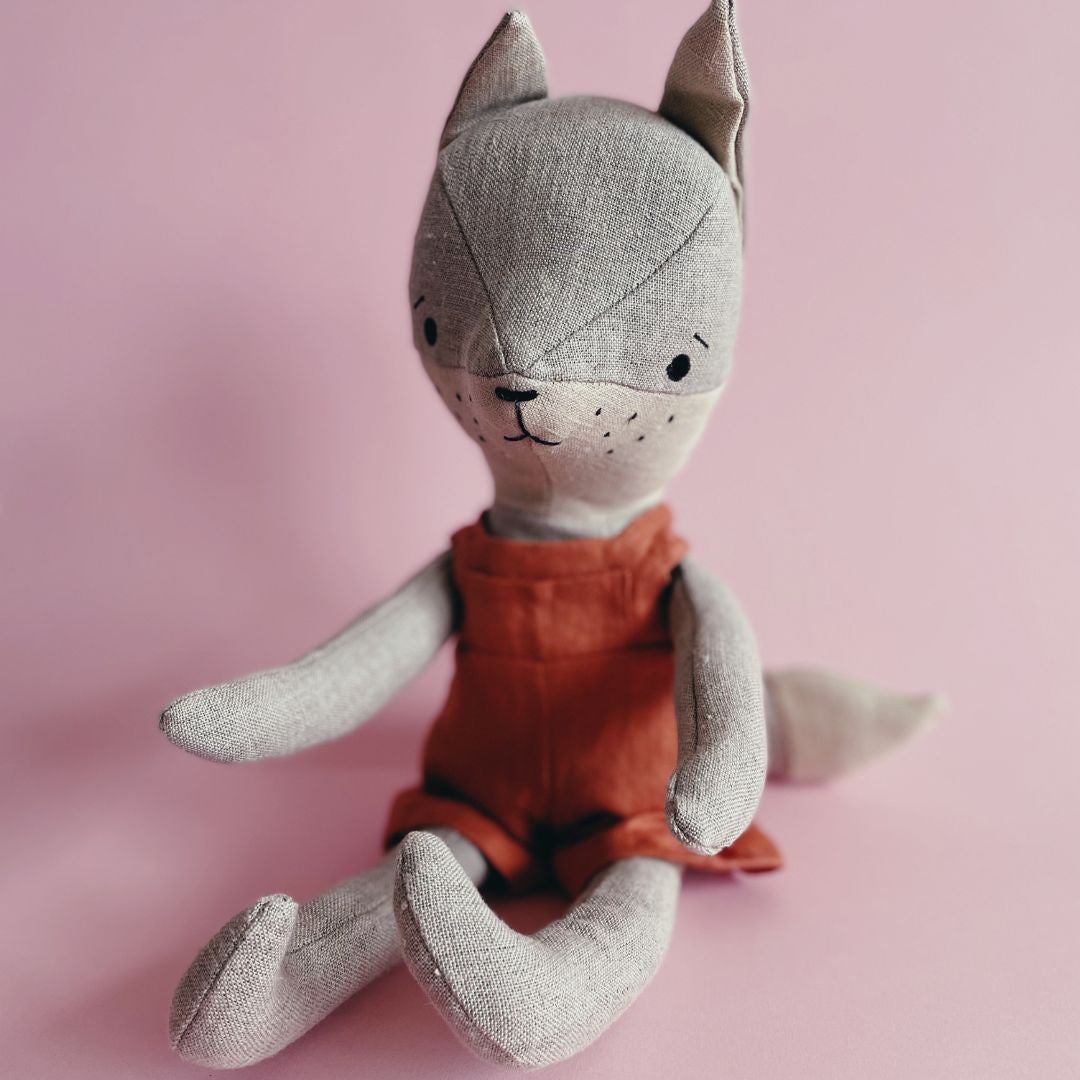 Filip the fox jumps out of the woodwork