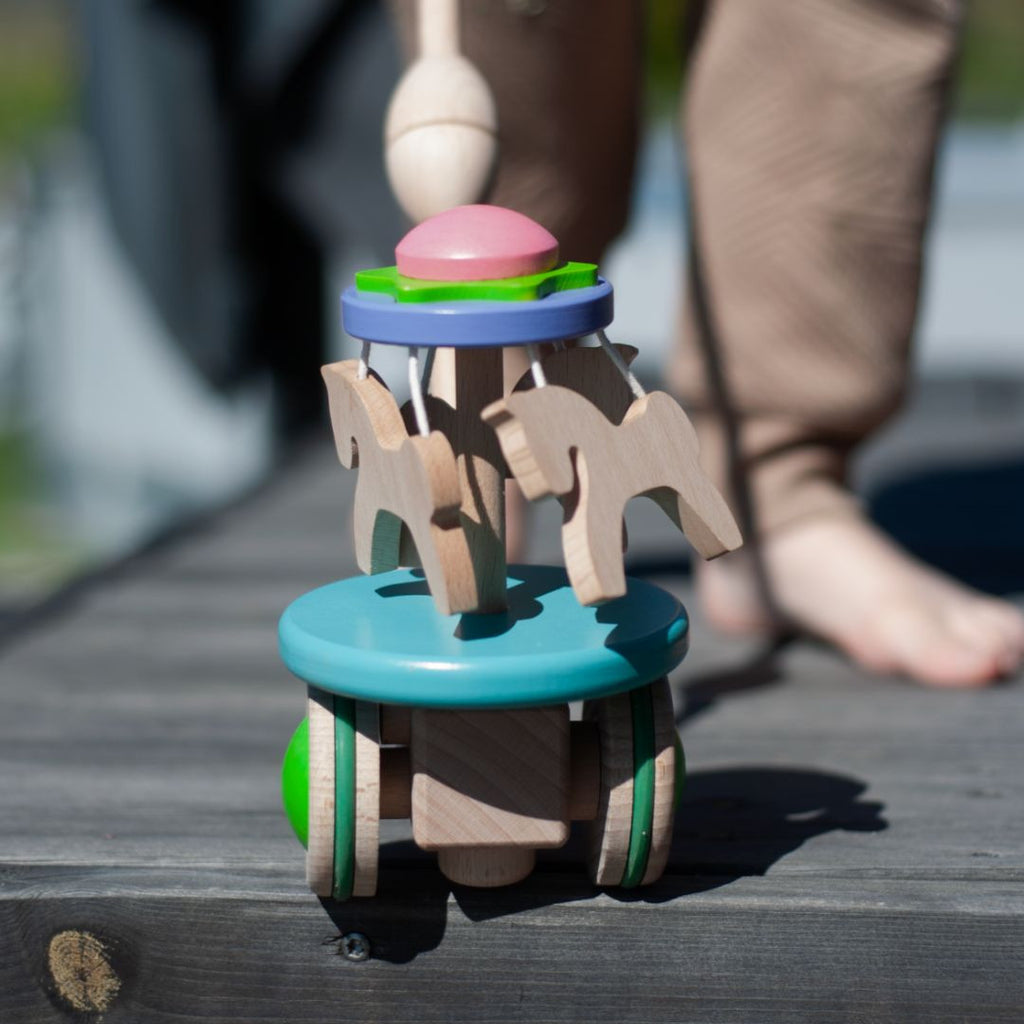Carousel with ponies - a push toy