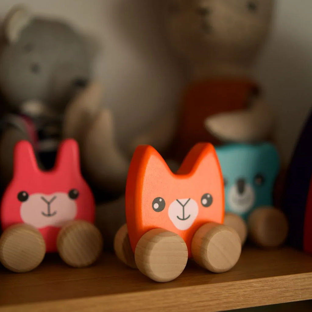 Colorful push-along animals on wheels